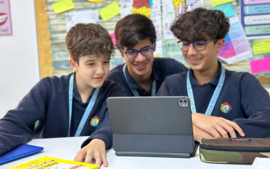 Students at Universal American School Dubai participating in classroom and outdoor activities