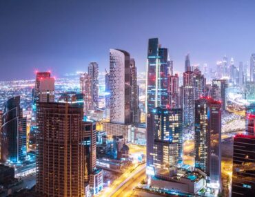 Dubai skyline with skyscrapers at night