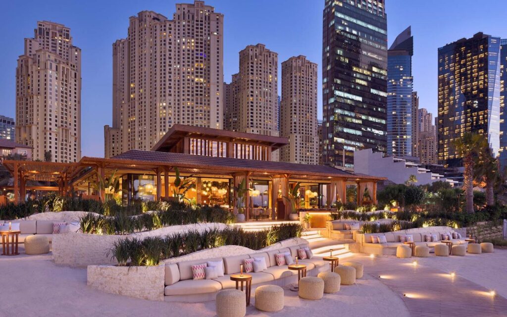 View of Tamoka beachfront restaurant in Dubai during sunset.