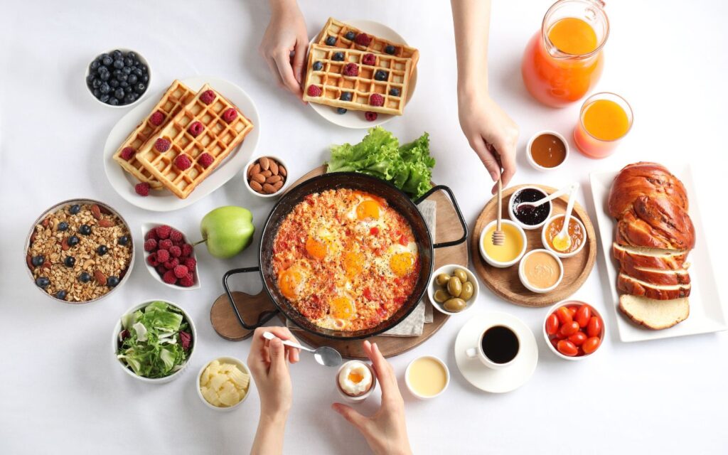 Vibrant brunch dishes arranged on a table for a festive Dubai meal.