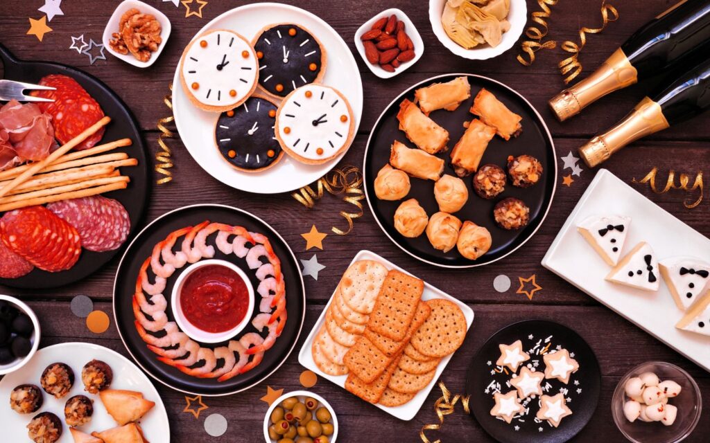 Brunch table setup with plates, pastries, and festive drinks in Dubai.