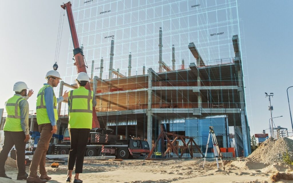 Construction workers inspecting a building site with a crane and blueprint overlay.