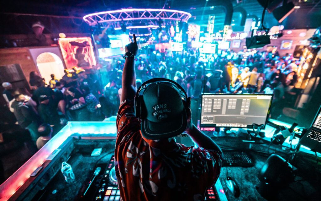 DJ spinning discs for the entrainment of party goers