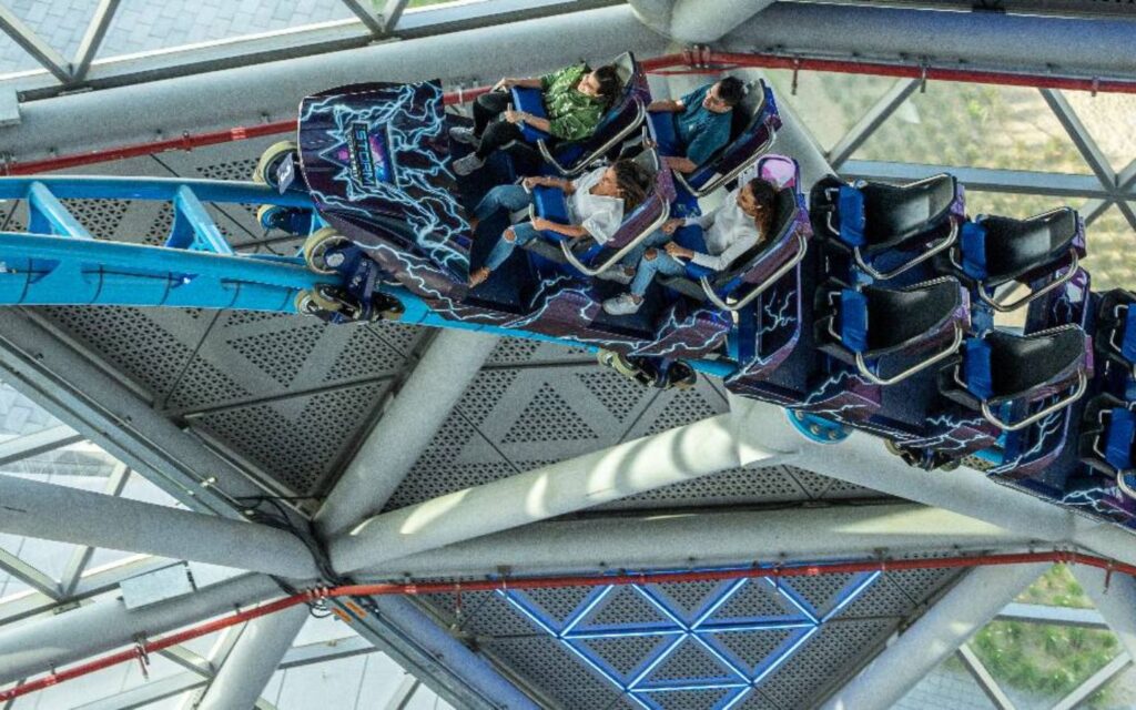 Visitors enjoying a ride on the Storm Coaster in Dubai Hills Mall