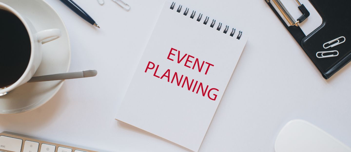 A professional writing pad nestled among organized stationery, curated by top event management companies in Abu Dhabi.