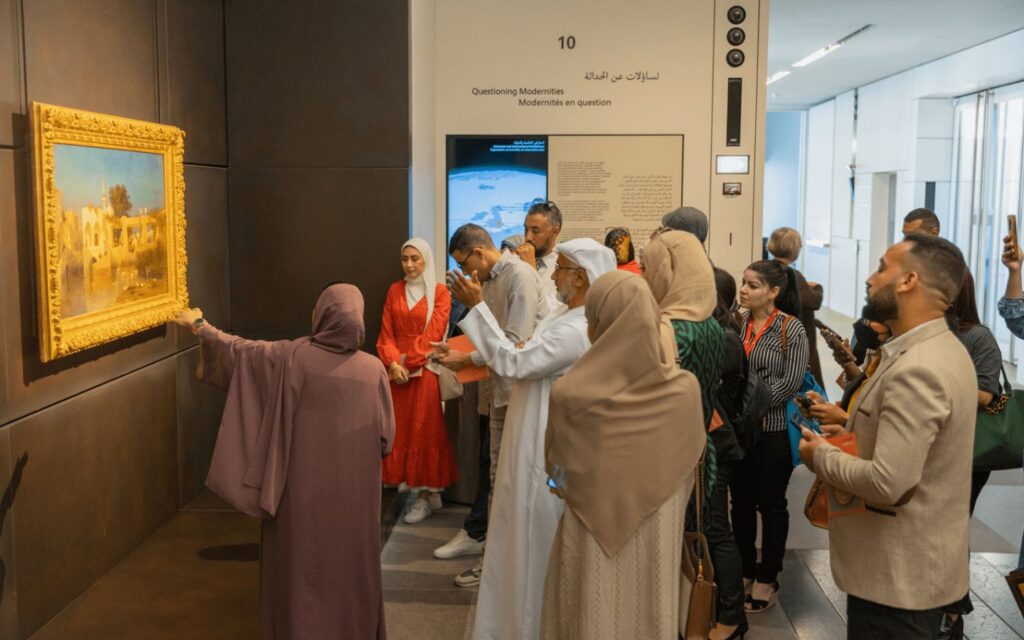 Educator guiding people through the museum’s standout pieces