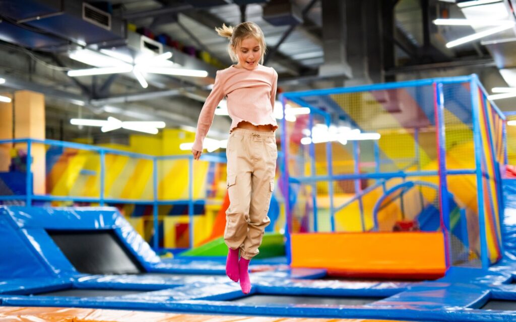 Kids bouncing on trampoline