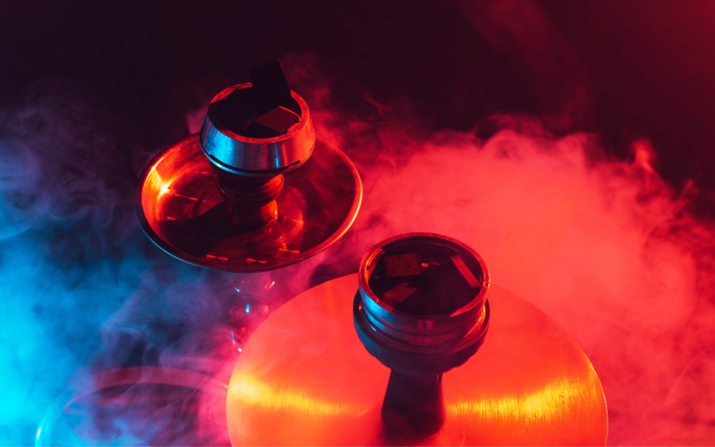 Indoor lounge atmosphere featuring hookahs and ambient lighting in Dubai.