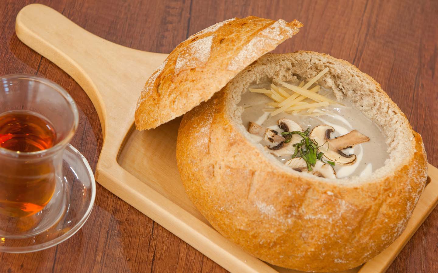 Try out the mushroom and pumpkin soup at First Clique that comes in a bread bowl