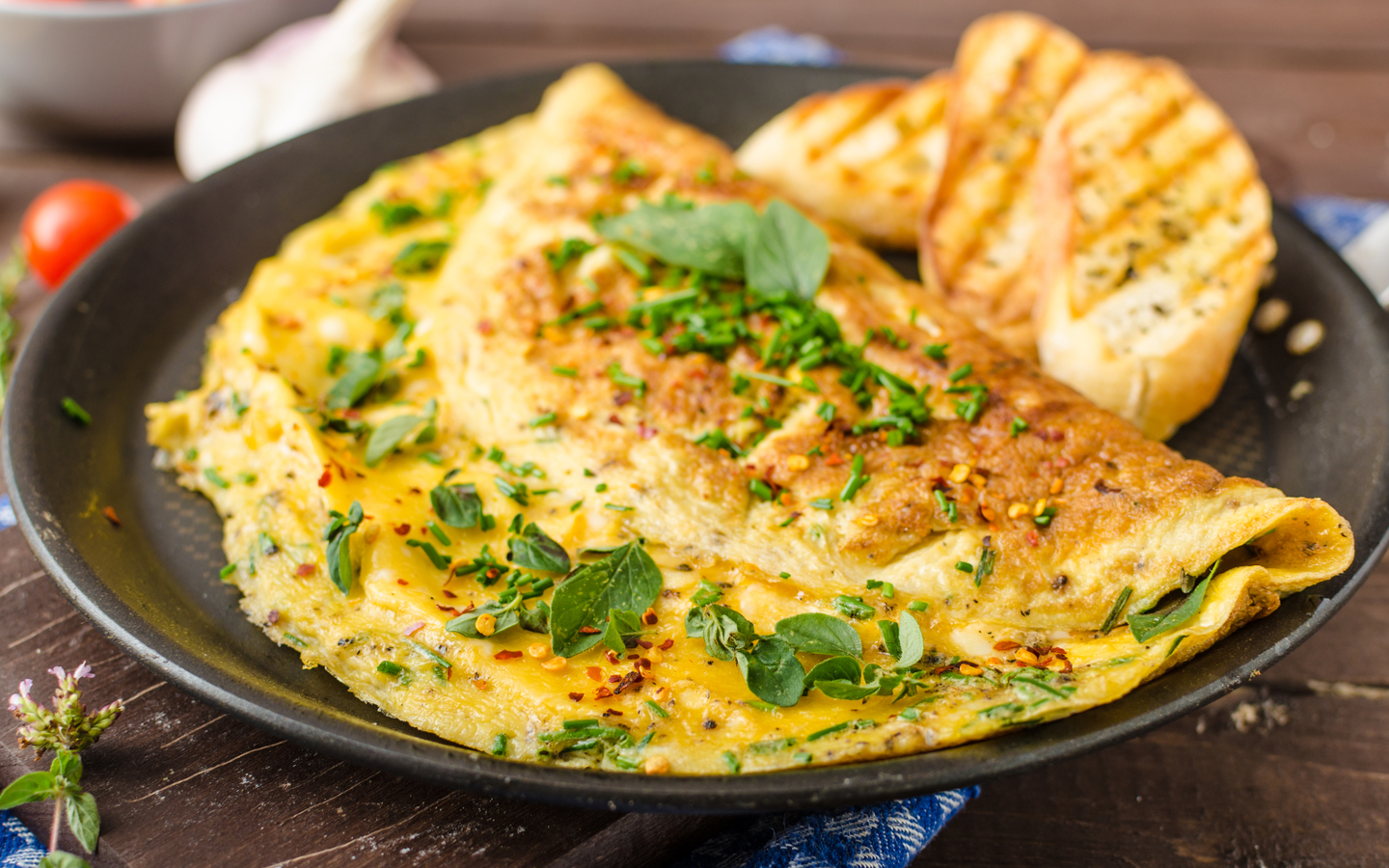 Omelette garnished with mint leaves