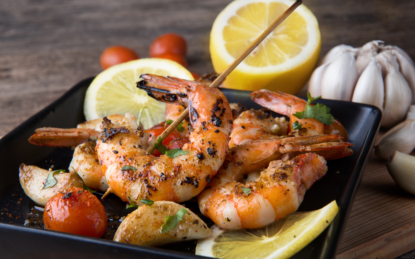 Prawns threaded onto different skewers