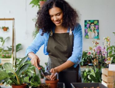 Women taking care of indoor plants in Dubai