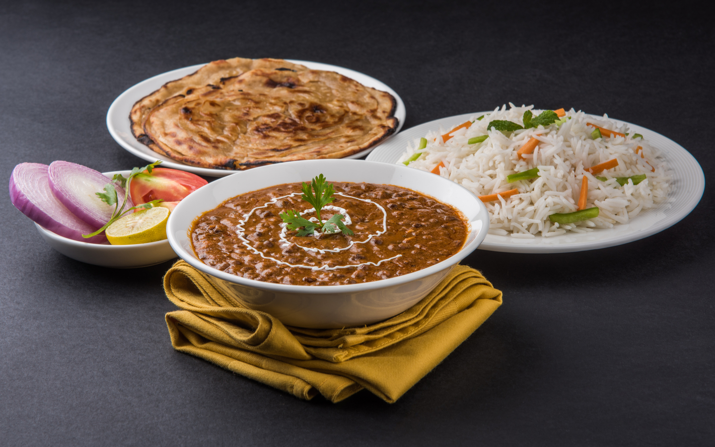 Daal Makhni served with butter roti and plain rice